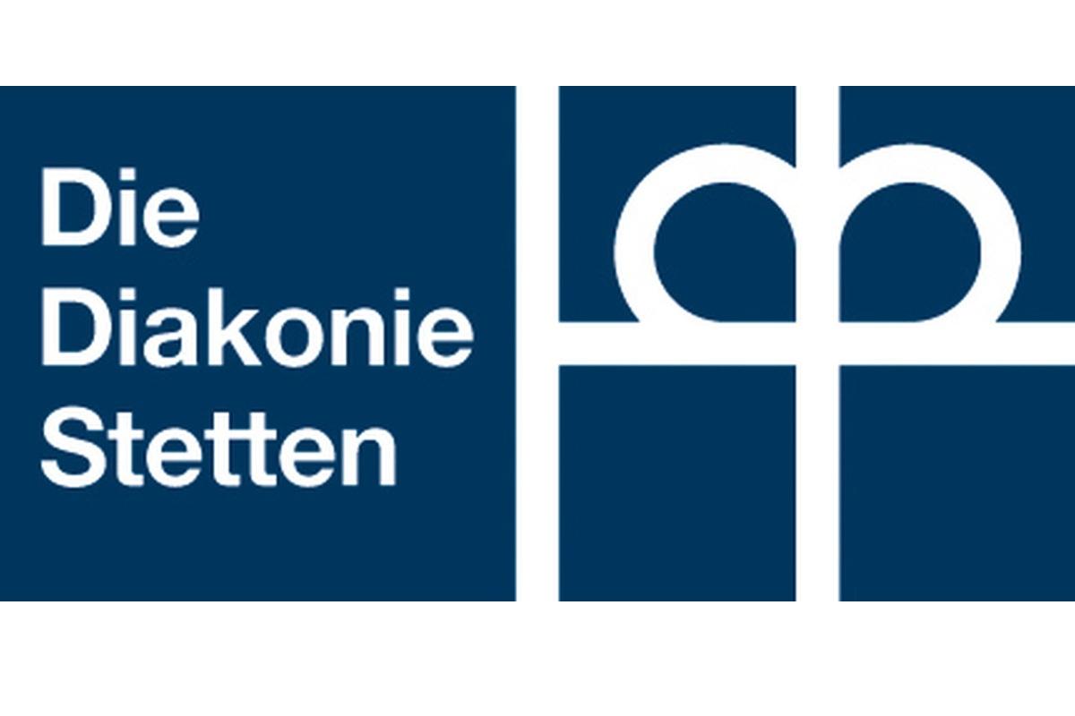 Logo Die Diakonie Stetten: zwei dunkelblaue Quadrate, ein Quadrat mit weißer Schrift, ein Quadrat mit weißem streifen diagonal und senkrecht
